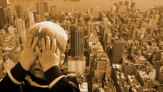 Awakening to the Power of Healing Our Core Wounds boy covering up his face as if afraid of the tall city landscape behind him