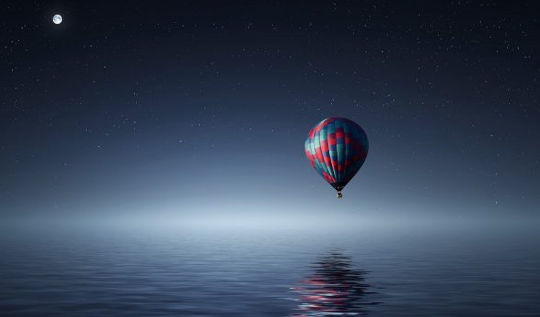 Fear Unceasing or Life Abundant? Blue Moon Cycle in Aquarius full moon over a hot air balloon