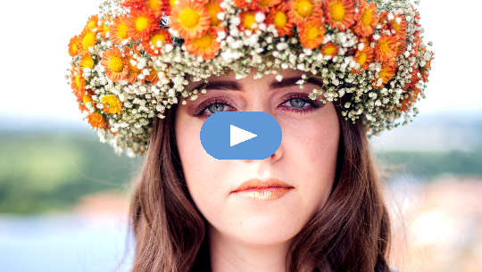 Hold That Unwavering Gaze! woman wearing a crown of flowers staring with an unwavering gaze