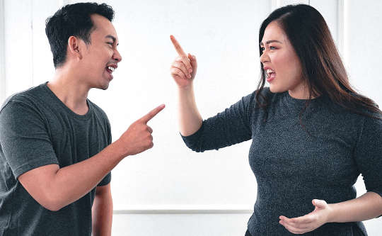 4 Relationship Killers and How to Cut Them off at the Pass a couple arguing and pointing fingers at each other