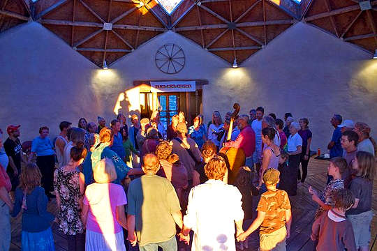 a group dancing at a Dance of Universal Peace gathering