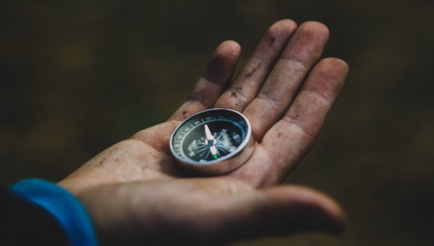 How to Break Free from People-Pleasing and Find True Joy A compass in the palm of a hand. Image by dima_goroziya from Pixabay.