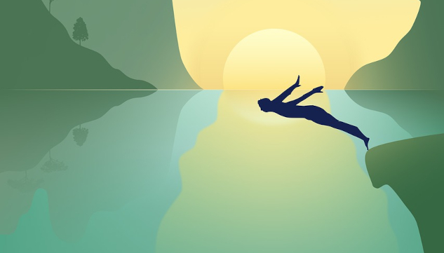 Image of a person diving off a cliff into a pool of water.&nbsp;Image by Leo from Pixabay.&nbsp;