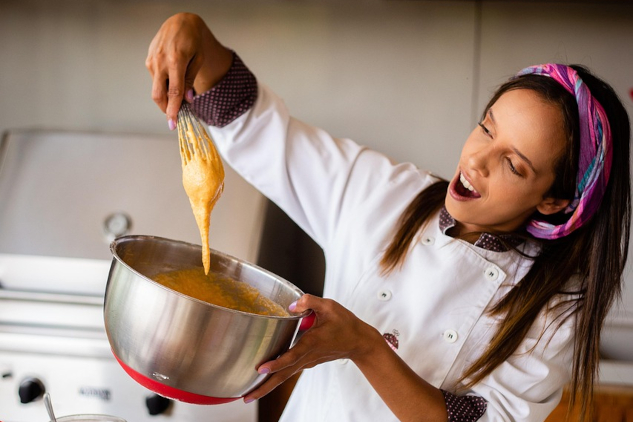 What's Your Recipe for a Happy Life? Image by jramaraljr from Pixabay. A woman chef joyfully preparing food.